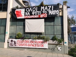 Bygging ERT3 þakin í kröfuspjöldum